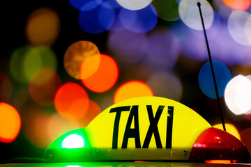 Taxi at night with lights signal system works.