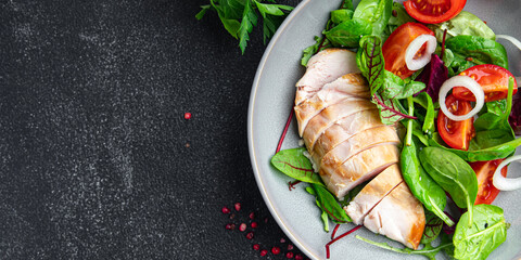 easter salad chicken breast with vegetables tomato, onion, green lettuce mix leaves veggie fresh portion healthy meal food diet snack on the table copy space food background rustic keto or paleo diet
