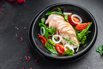 easter salad chicken breast with vegetables tomato, onion, green lettuce mix leaves veggie fresh portion healthy meal food diet snack on the table copy space food background rustic keto or paleo diet
