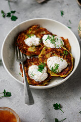 Zucchini pancakes with pike caviar
