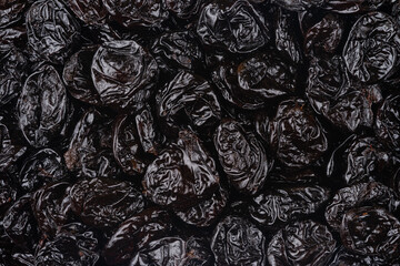 Pattern of dried prunes. Top view, overhead.