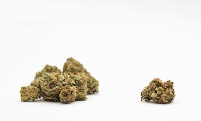 marijuana buds with central space for text, white background