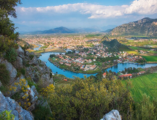 Fototapeta na wymiar A beautiful panorama of the Dalyan river valley with a view of the town, mountains and river from the view point of ancient city of Kaunos
