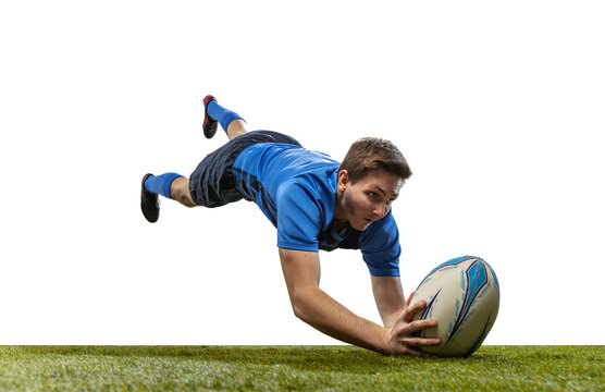 In action. Male rugby player catching ball in jump isolated on white background. Jump and action concept. an incredible strain of all forces