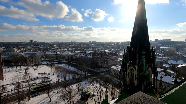 Time-lapse of the city landscape in winter, a panoramic view from the observation deck of the Church of Saints Elizabeth and Olga, on the buildings and cathedrals of Lviv