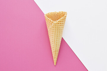 waffle cone on geometric colorful background