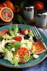 Plate of delicious sicilian orange salad on table, closeup