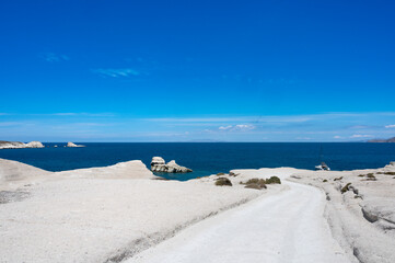 Sarakiniko Beach, mediterranean landscape with white shaped volcanic rocks - Milos Island, Cyclades, Greece