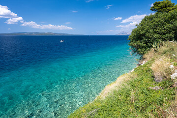 Fototapeta na wymiar beautiful coast with azure sea on Makarska riviera in Dalmatia in Croatia