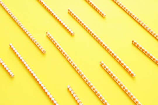 background with tubes diagonally on a yellow background