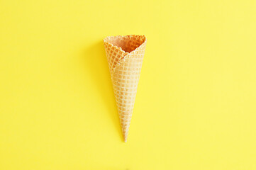 waffle cup empty close up on yellow background
