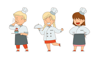 Little Boy and Girl Chef in White Toque and Jacket Holding Plate with Served Appetizing Meal Vector Illustration Set