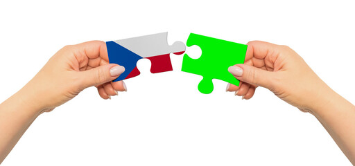Woman hands are holding part of puzzle game. National mock up on white background. Czech Republic