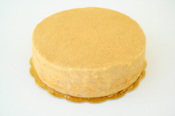 Whole eight-layered honey cake. Russian cake Medovik with walnuts.