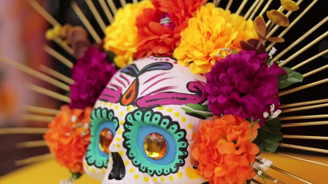 Mexican colored skull with headband decoration for Day of the deads