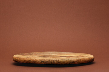 empty wooden podium board on brown background