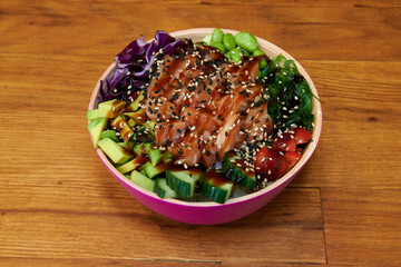 Set of fresh poke bowl with salmon, avocado, chukka, basil,shrimp and smoked fish on red background