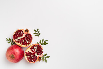 Fresh juicy pomegranate on white background, top view