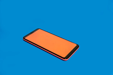 Mobile phone on blue background
