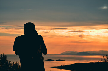 silhouette of a man on sunset