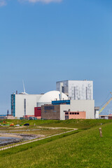 Fototapeta na wymiar Cityscape of village and nuclear power plant Borssele in Zeeland in The Netherlands