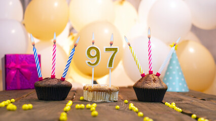 A beautiful birthday card for a woman with the number 97 in a cupcake against the background of...