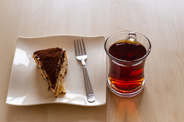 a cup of tea and tiramisu
