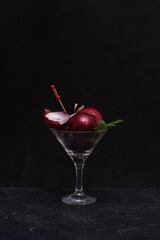 Red onion in a glass transparent glass