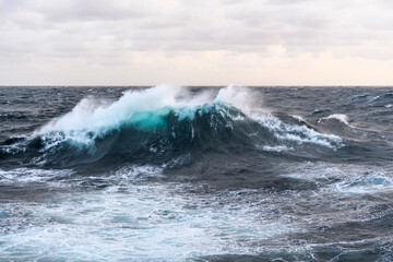 Seascape, blue sea. Windy weather. View from vessel. Waves at sea. Storm.