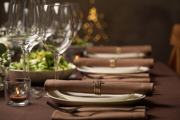 Stylish elegant table setting for festive dinner in restaurant