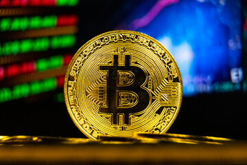 Bitcoin BTC with stock market statistics on background. Crypto currency growth in world e-commerce system financial concept