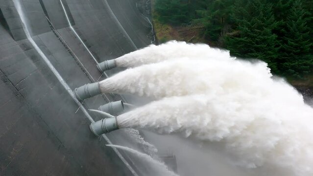 Hydroelectric Power Station Pumping Water Through a Dam Slow Motion