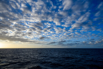 Obraz premium Beautiful seascape - waves and sky with clouds with beautiful lighting. Caribbean sea. Mediterranean sea.