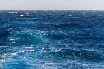 Beautiful seascape - waves and sky with clouds with beautiful lighting. Caribbean sea. Mediterranean sea.