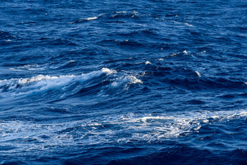 Naklejka premium Beautiful seascape - waves and sky with clouds with beautiful lighting. Caribbean sea. Mediterranean sea.