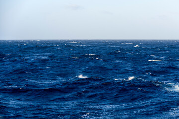 Beautiful seascape - waves and sky with clouds with beautiful lighting. Caribbean sea. Mediterranean sea.