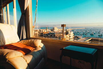 Amazing view from a rent apartment in central alexandria, view from a tall building of the beautiful port filled with fishing ships at sunrise