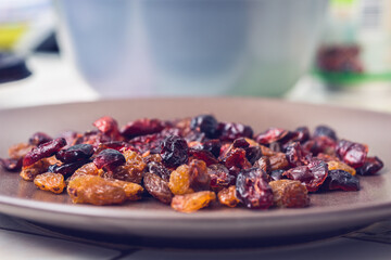 Close up of a plate of dried raisins