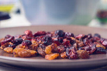 Close up of a plate of dried raisins