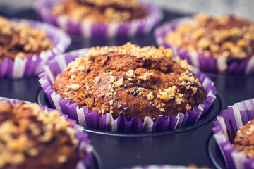 Home made intregral delicious muffins with bananas, nuts and raisin.