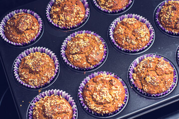 Home made intregral delicious muffins with bananas, nuts and raisin.
