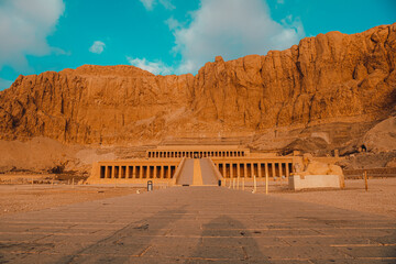 Closer view of the amazing hatshepsut temple near luxor egypt. Single road leading to the huge...