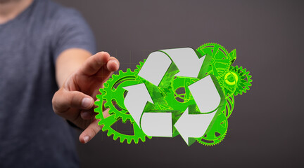 Mechanism, green metallic gears and cogs at work on brown background. Industrial machinery. 3D