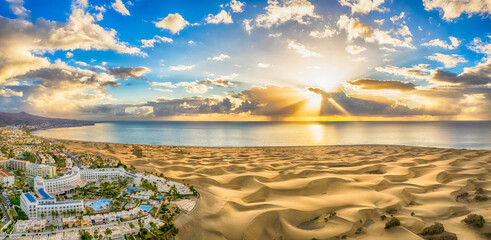 Landscape with Maspalomas town and golden sand dunes at sunrise, Gran Canaria, Canary Islands, Spain - 487858098