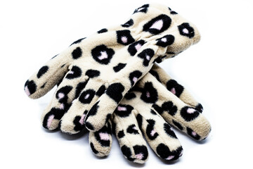 A pair of gloves with black and white spots
