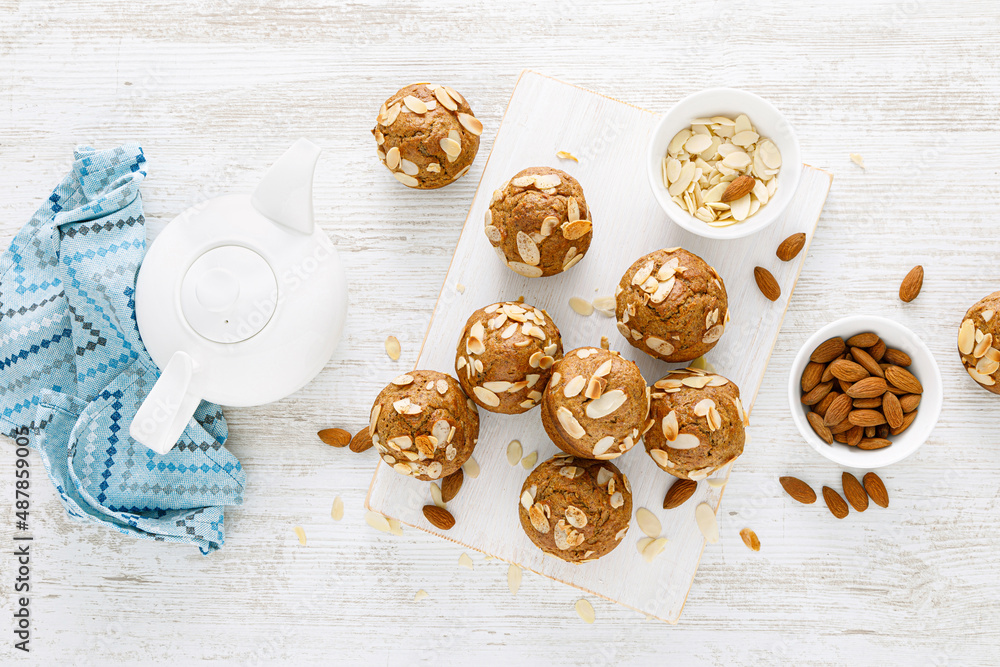 Sticker Muffins with flaked almond nuts. Cupcakes with nut chips. Top view