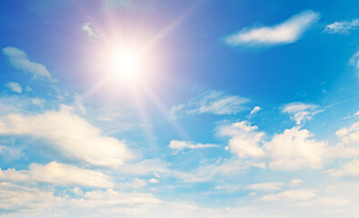 Obraz na płótnie Canvas Blue sky, sun and Cumulus clouds.