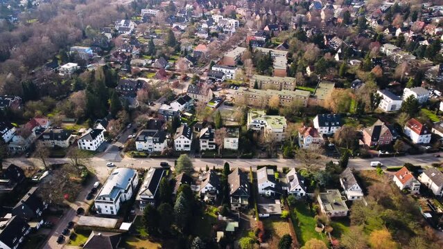 Drone Shot of Suburban houses and street with cars