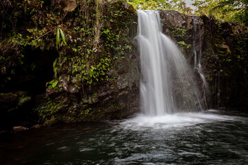 Fototapeta na wymiar Stunning waterfall along the Road to Hana in Maui.