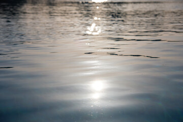 Closeup surface of blue clear water with small ripple waves in swimming pool